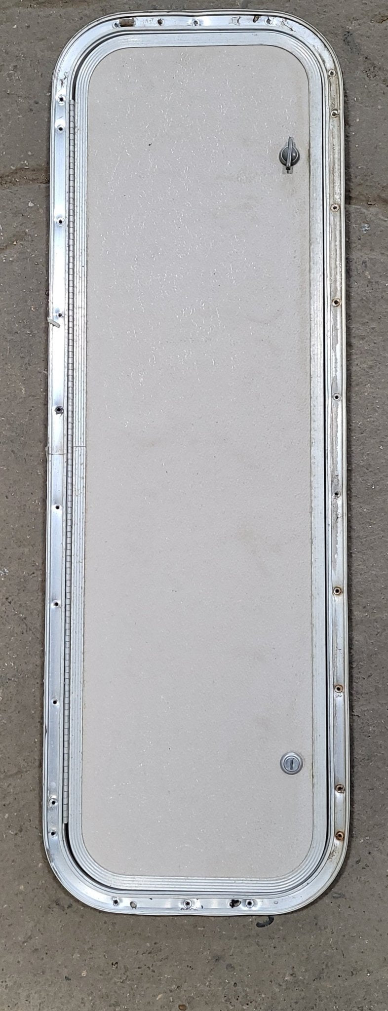 Used Radius Cornered Cargo Door 34 3/4" W x 10 3/4" H x 1/2" D - Young Farts RV Parts