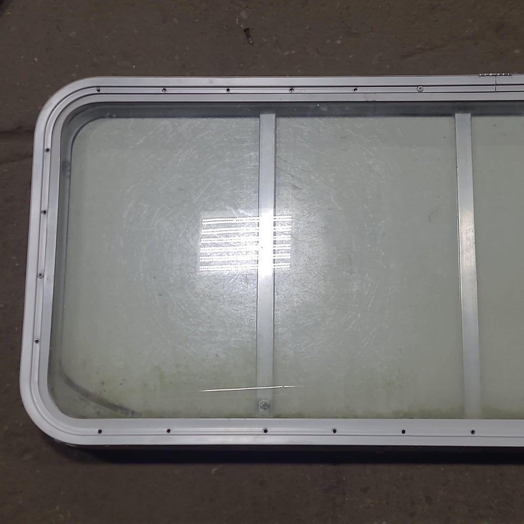 Used Radius Opening Rock Guard Covered Window : 53 1/4" x 21 1/4" X 1 3/4" D - Young Farts RV Parts