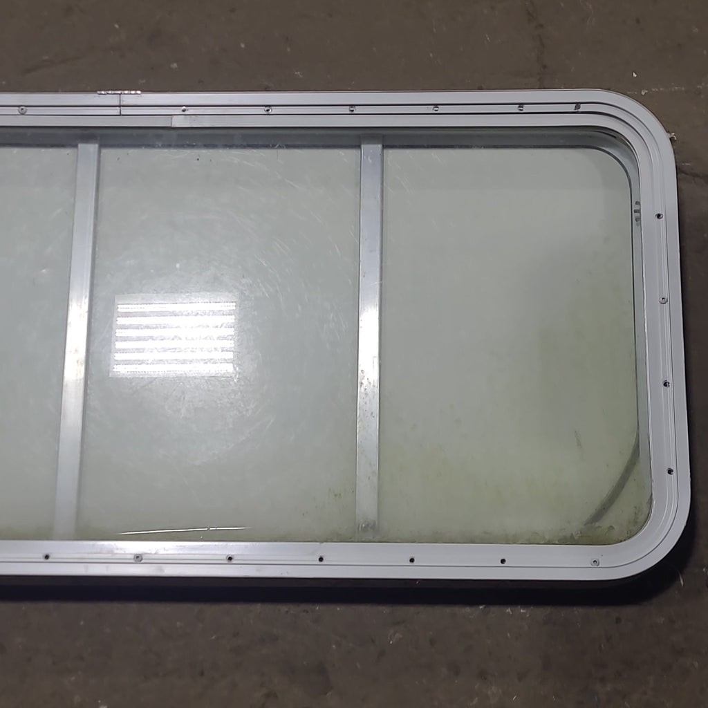 Used Radius Opening Rock Guard Covered Window : 53 1/4" x 21 1/4" X 1 3/4" D - Young Farts RV Parts