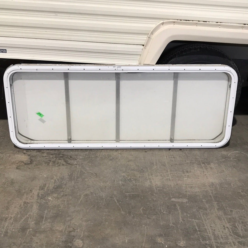 Used Radius Opening Rock Guard Covered Window: 59 3/4" X 21 1/2" X 1 1/2" D - Young Farts RV Parts