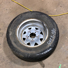 Load image into Gallery viewer, Used RV Tire &amp; Rim 14&quot; 5 bolt - Young Farts RV Parts