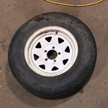 Load image into Gallery viewer, Used RV Tire &amp; Rim 14&quot; 5 bolt - Young Farts RV Parts