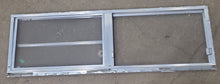 Load image into Gallery viewer, Used Silver Square Emergency Opening Window: 59 3/4&quot; X 17 3/4&quot; X 1 1/2&quot; D - Young Farts RV Parts