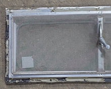 Load image into Gallery viewer, Used Silver Square Opening Window: 24&quot; W x 8 1/2&quot; H x 3/4&quot; D - Young Farts RV Parts