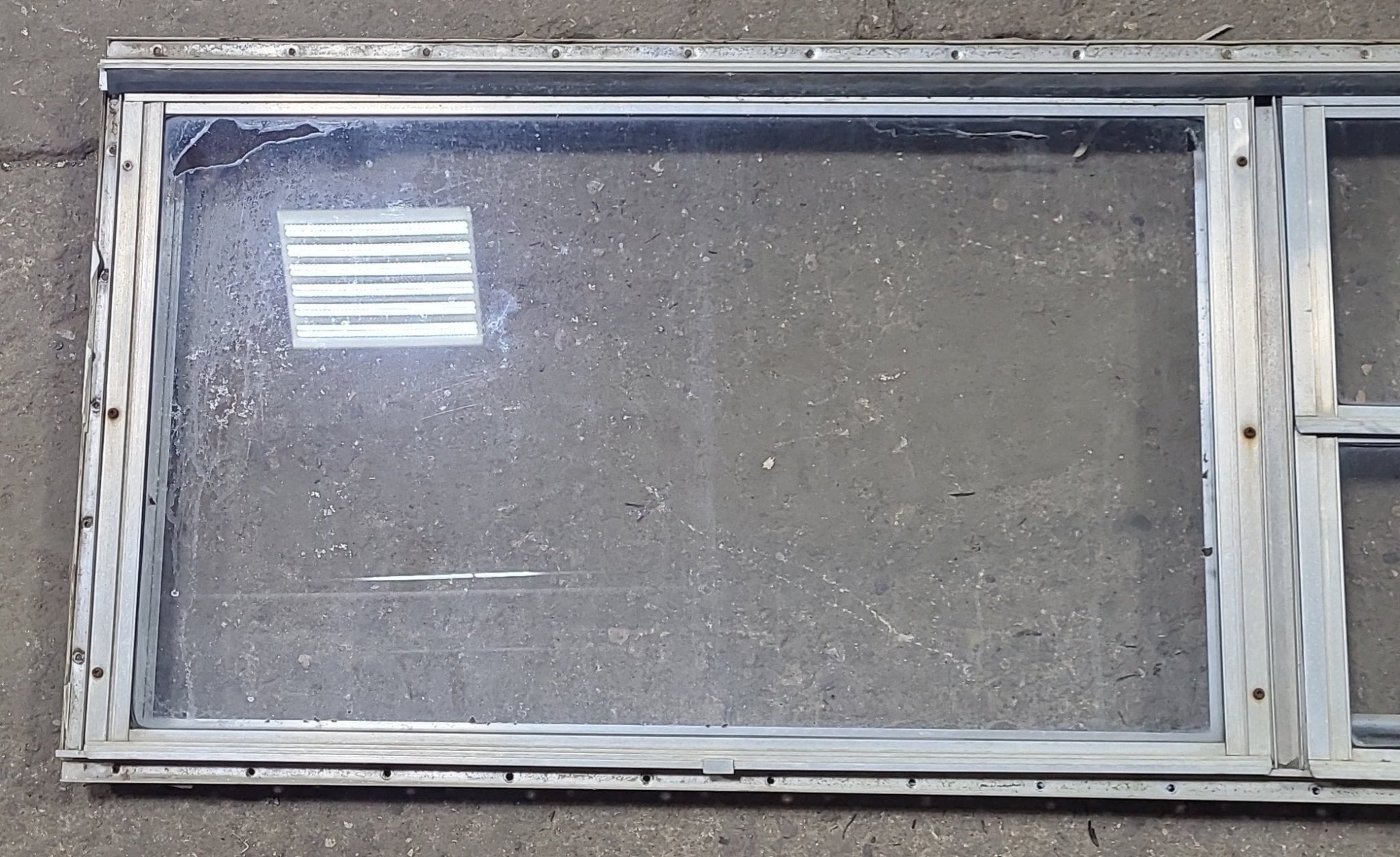 Used Silver Square Opening Window: 59 3/4" W x 18" H x 1 3/8" D - Young Farts RV Parts