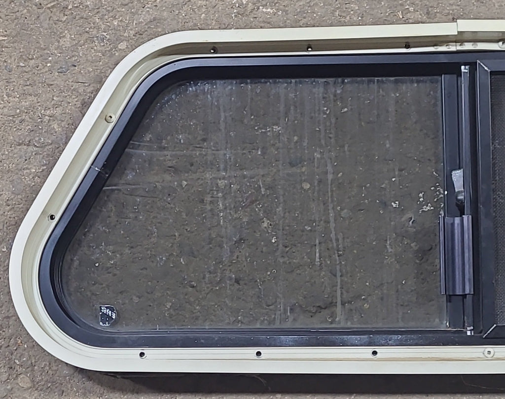 Used Slanted Black Radius Opening Window : 30 1/4" W X 11 3/4" H X 1 7/8" D - Young Farts RV Parts