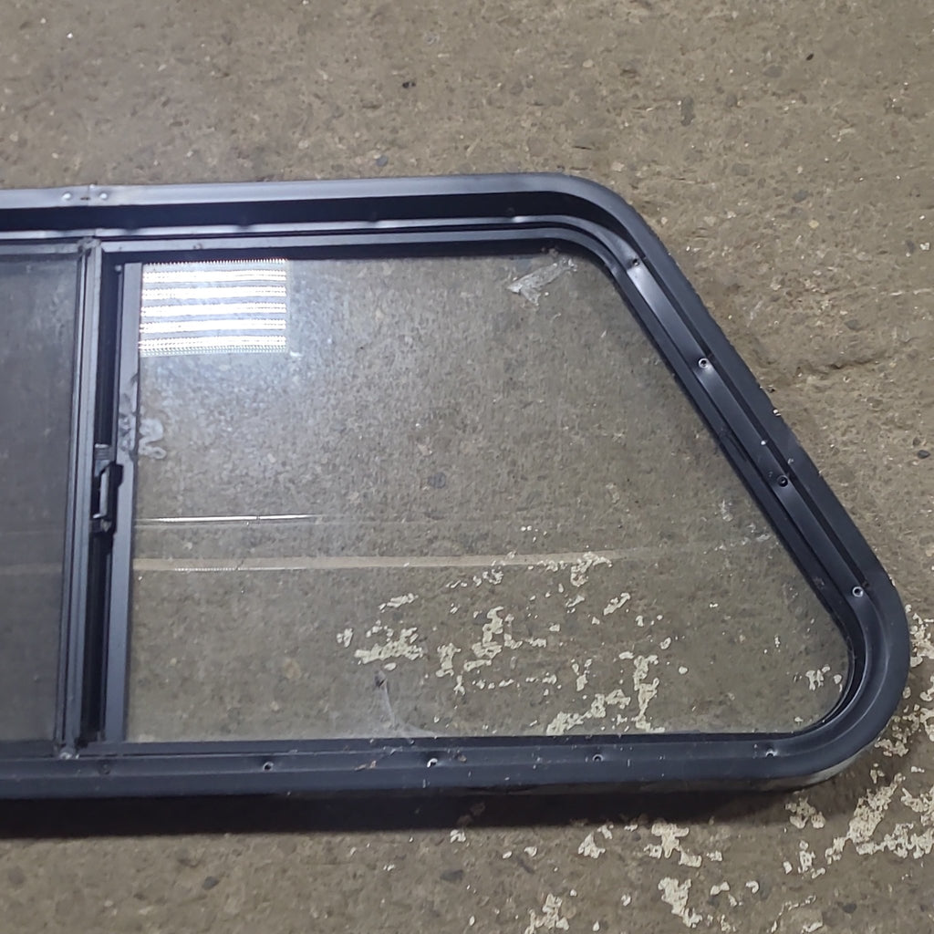 Used Slanted Black Radius Opening Window : 41 3/4" W x 17 3/4" H x 1 7/8" D - Young Farts RV Parts