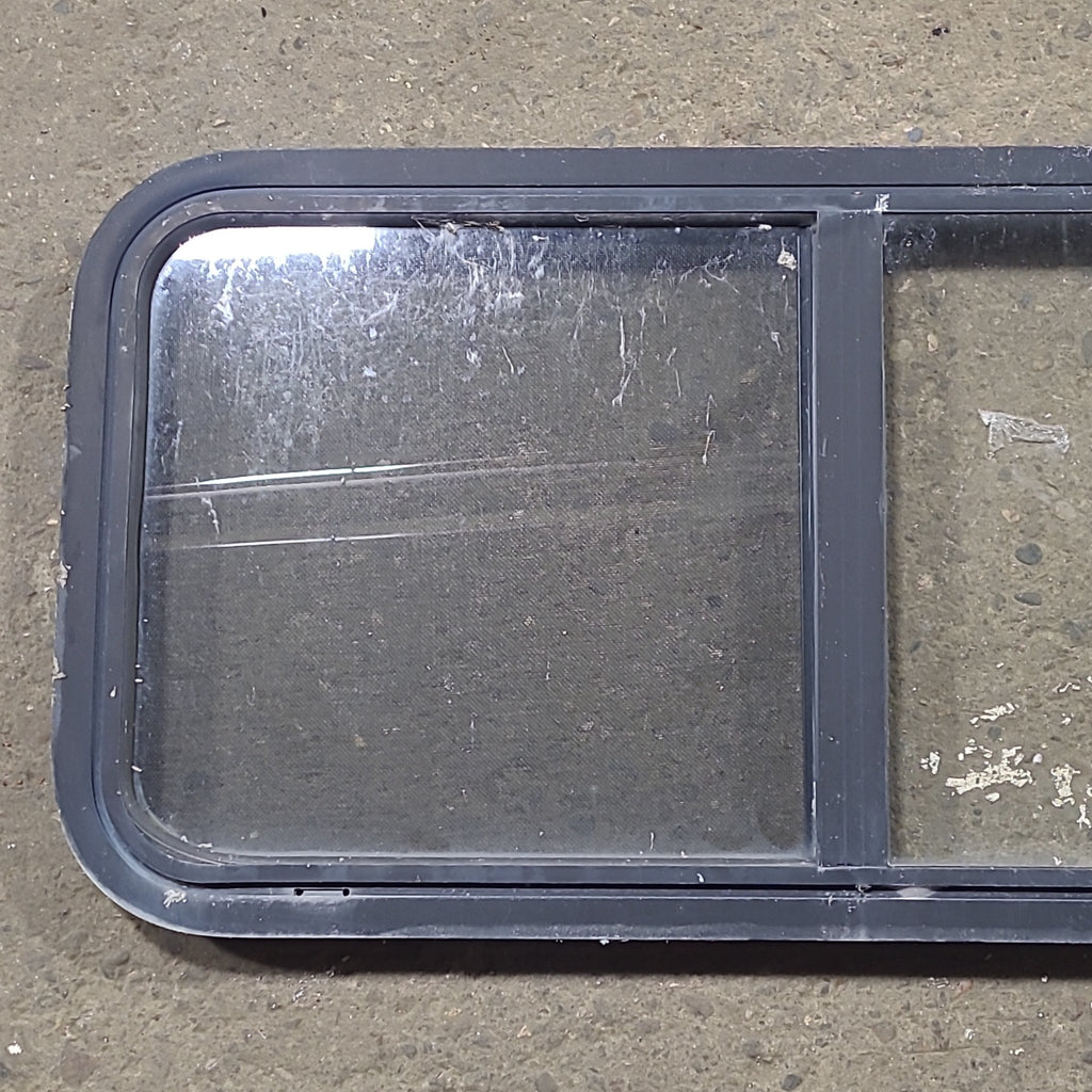 Used Slanted Black Radius Opening Window : 41 3/4" W x 17 3/4" H x 1 7/8" D - Young Farts RV Parts