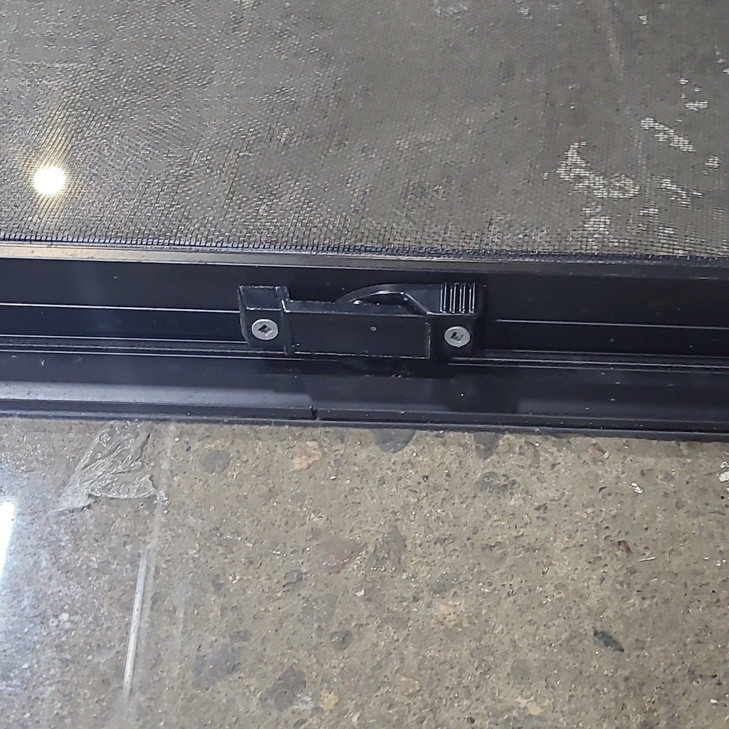 Used Slanted Black Radius Opening Window : 41 3/4" W x 17 3/4" H x 1 7/8" D - Young Farts RV Parts