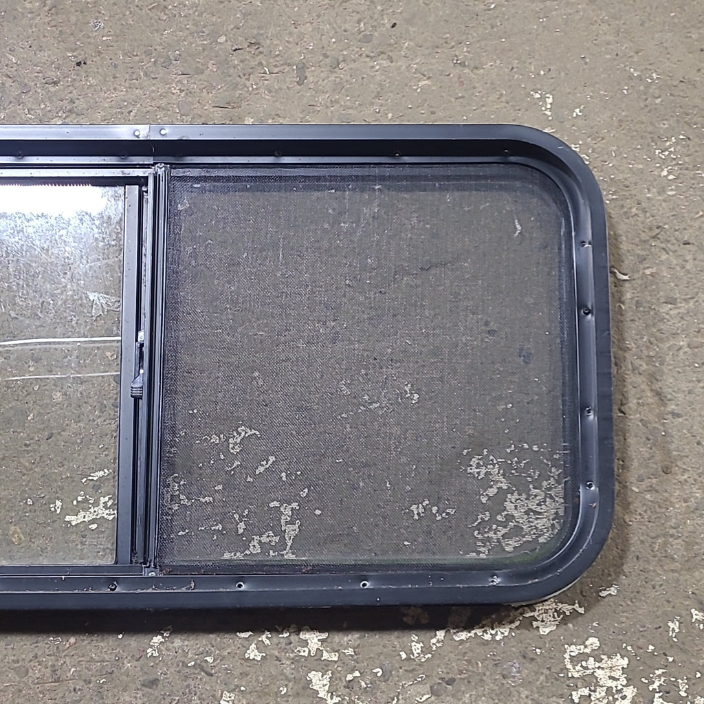 Used Slanted Black Radius Opening Window : 41 3/4" W x 17 3/4" H x 1 7/8" D - Young Farts RV Parts