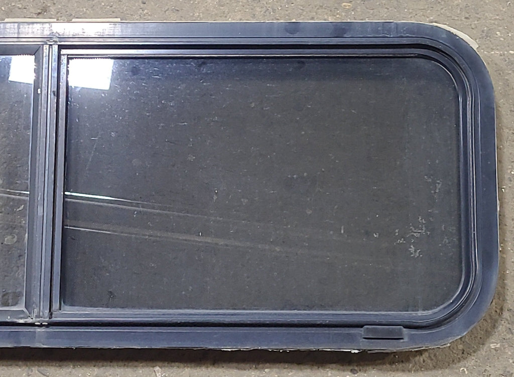 Used Slanted Black Radius Opening Window : 48 1/4" W x 15" H x 1 3/4" D - Young Farts RV Parts