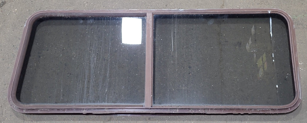 Used Slanted Brown Radius Opening Window : 22 1/8" H X 58 3/4" W X 2" D - Young Farts RV Parts