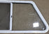 Used Slanted White Radius Opening Window : 21 1/2" H X 41" W X 2" D - Young Farts RV Parts