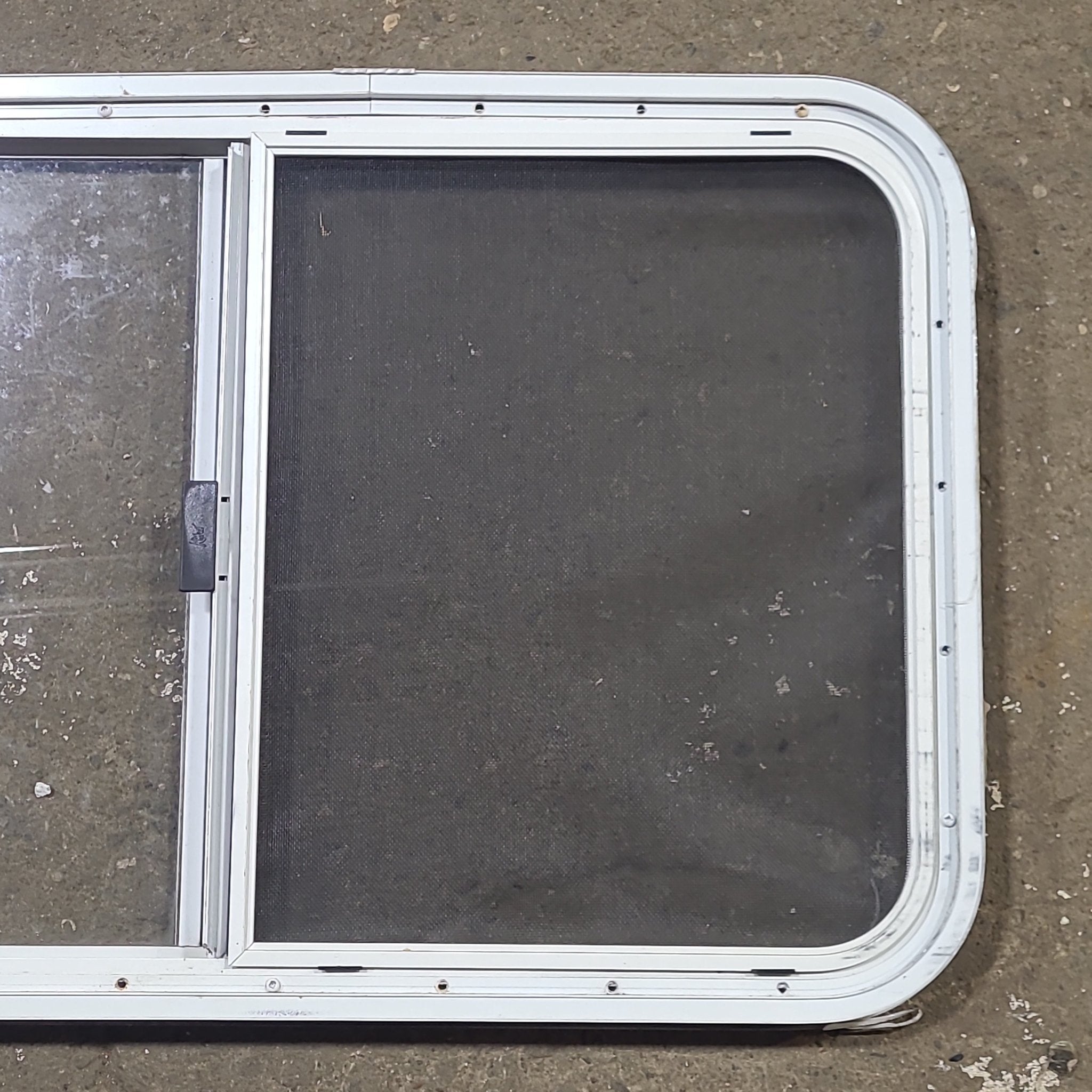 Used Slanted White Radius Opening Window : 21 1/4" H X 35 14" W X 1 1/4" D - Young Farts RV Parts