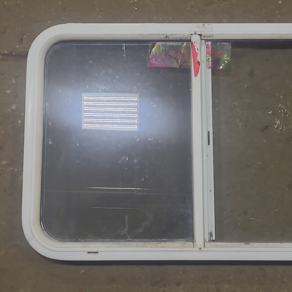 Used Slanted White Radius Opening Window : 40 1/2" W X 21 1/2" H X 1 1/4" D - Young Farts RV Parts