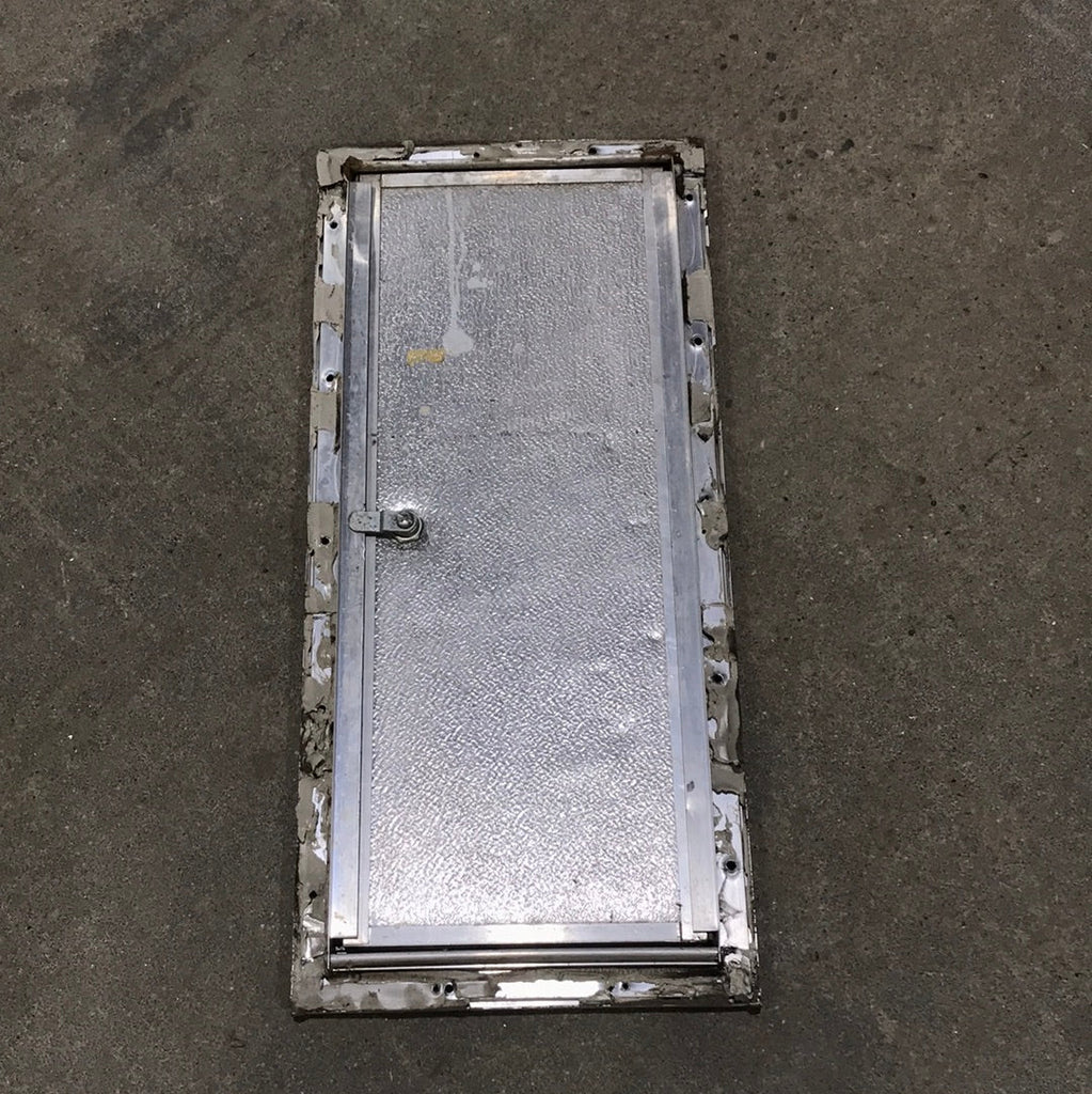 Used Square Corner cargo door 22 3/4" W x 9 3/8" H x 3/4"D - Young Farts RV Parts