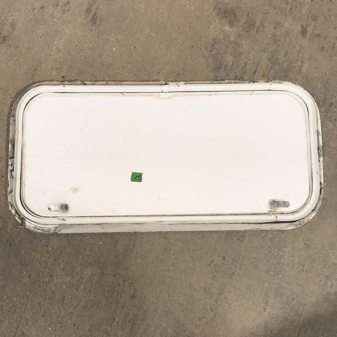 Used White Corner radius cargo door 29 3/4" W x 13 3/4" H x 1"D - Young Farts RV Parts