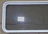 Used White Radius Non Opening Window : 54 1/4" W x 21 3/4" H x 1 7/8" D - Young Farts RV Parts