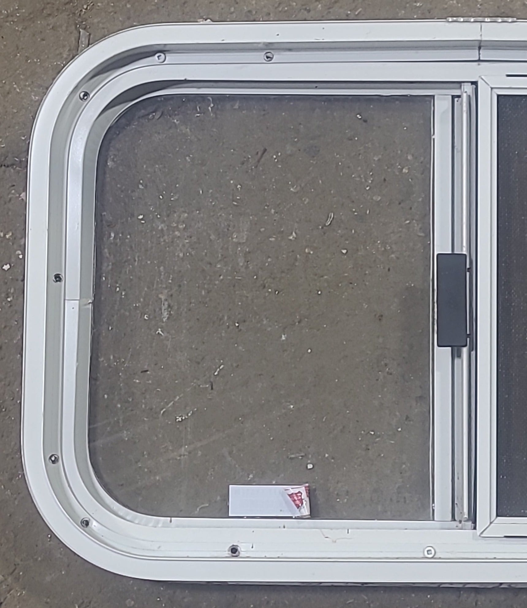 Used White Radius Opening Window : 23 1/2" W x 14 1/2" H x 1 7/8" D - Young Farts RV Parts
