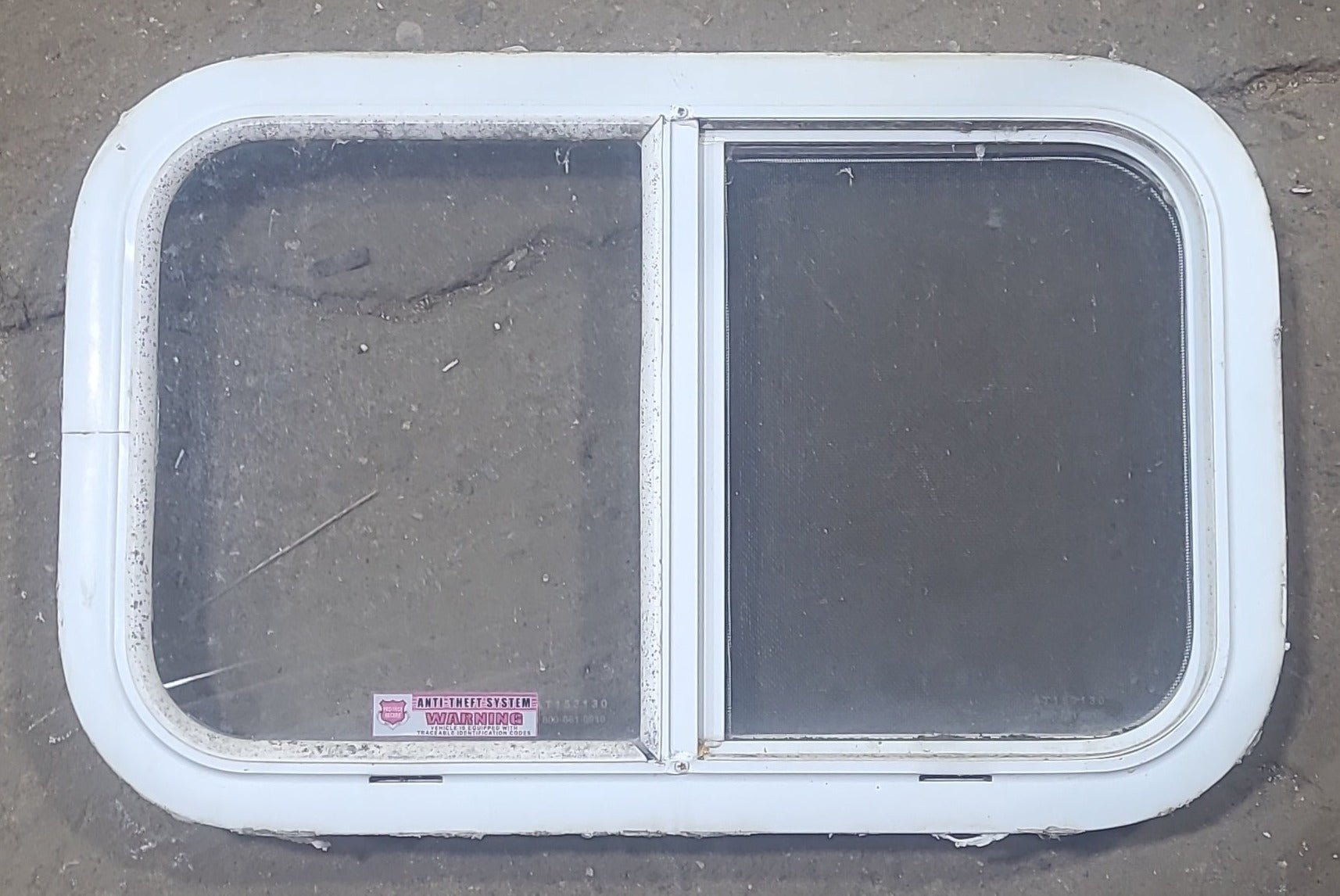 Used White Radius Opening Window : 23 1/2" W x 14 1/2" H x 1 7/8" D - Young Farts RV Parts