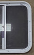 Used White Radius Opening Window : 23 1/2" W x 21 1/2" H x 2" D - Young Farts RV Parts