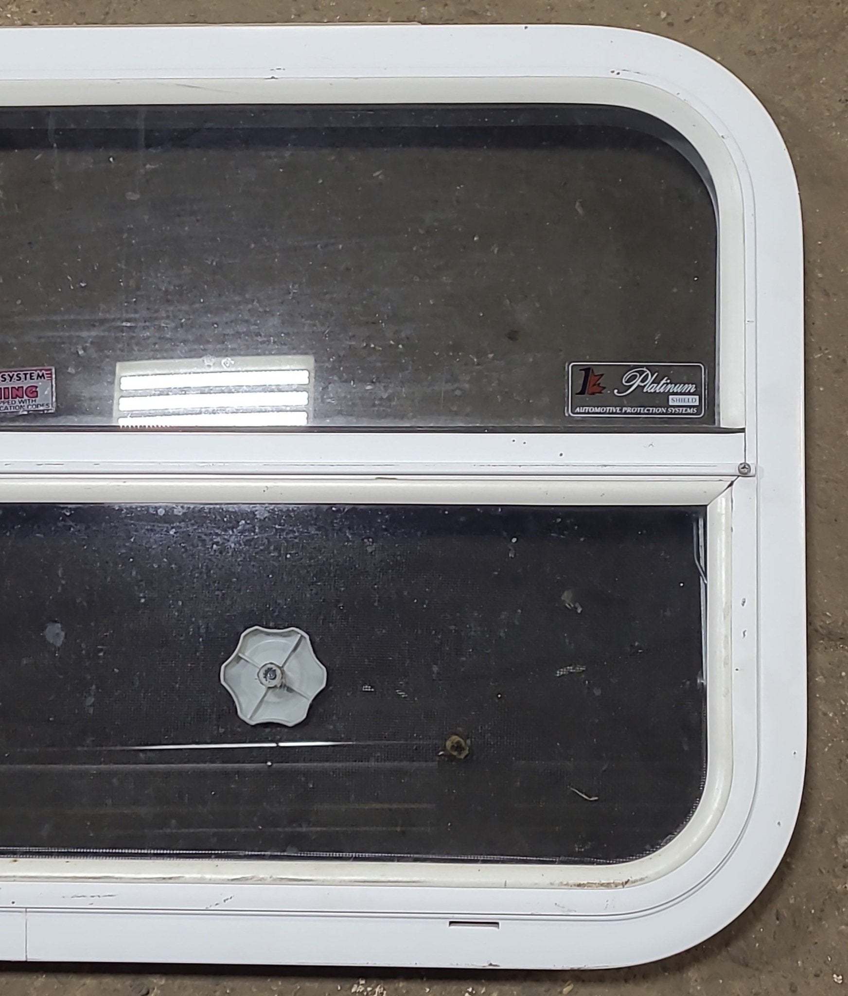 Used White Radius Opening Window : 23 3/8" W x 17 1/2" H x 1 7/8" D - Young Farts RV Parts