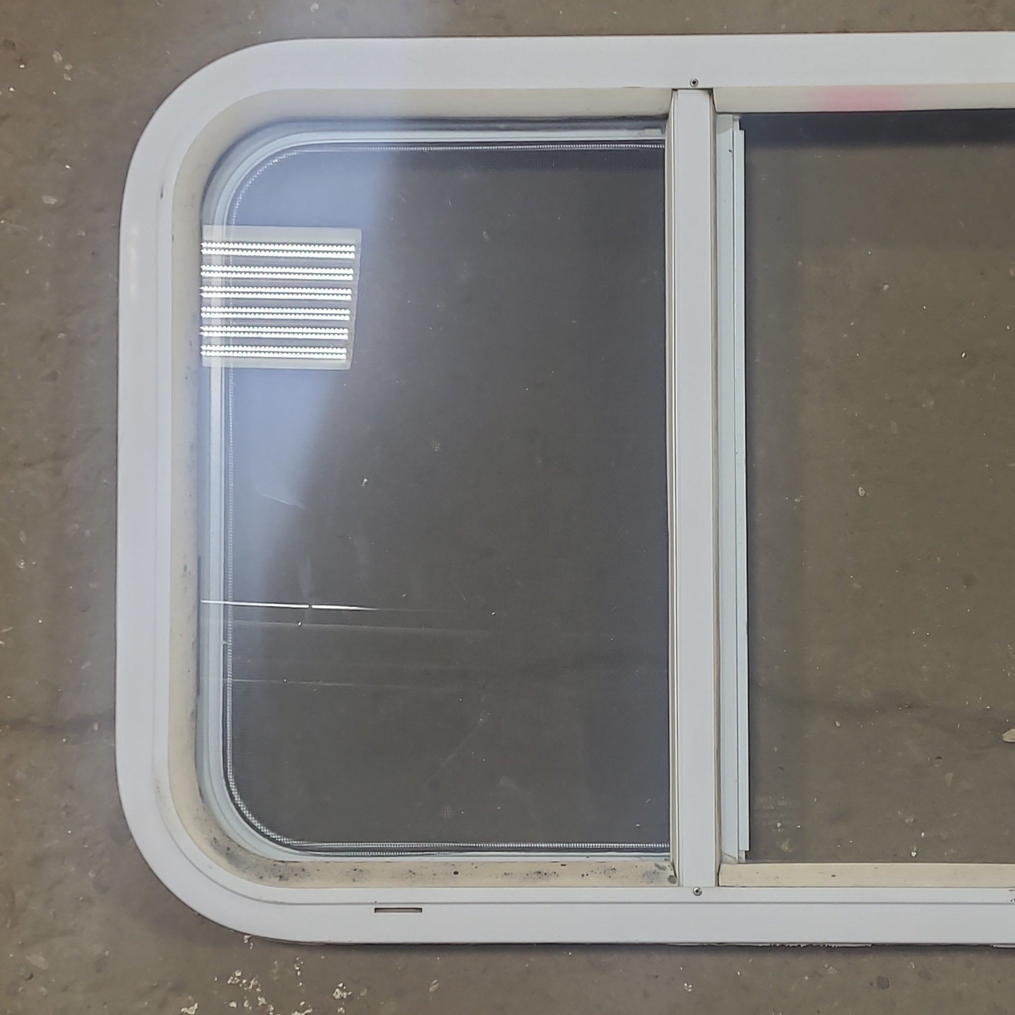 Used White Radius Opening Window : 24 1/4" W x 17 3/4" H x 1 7/8" D - Young Farts RV Parts