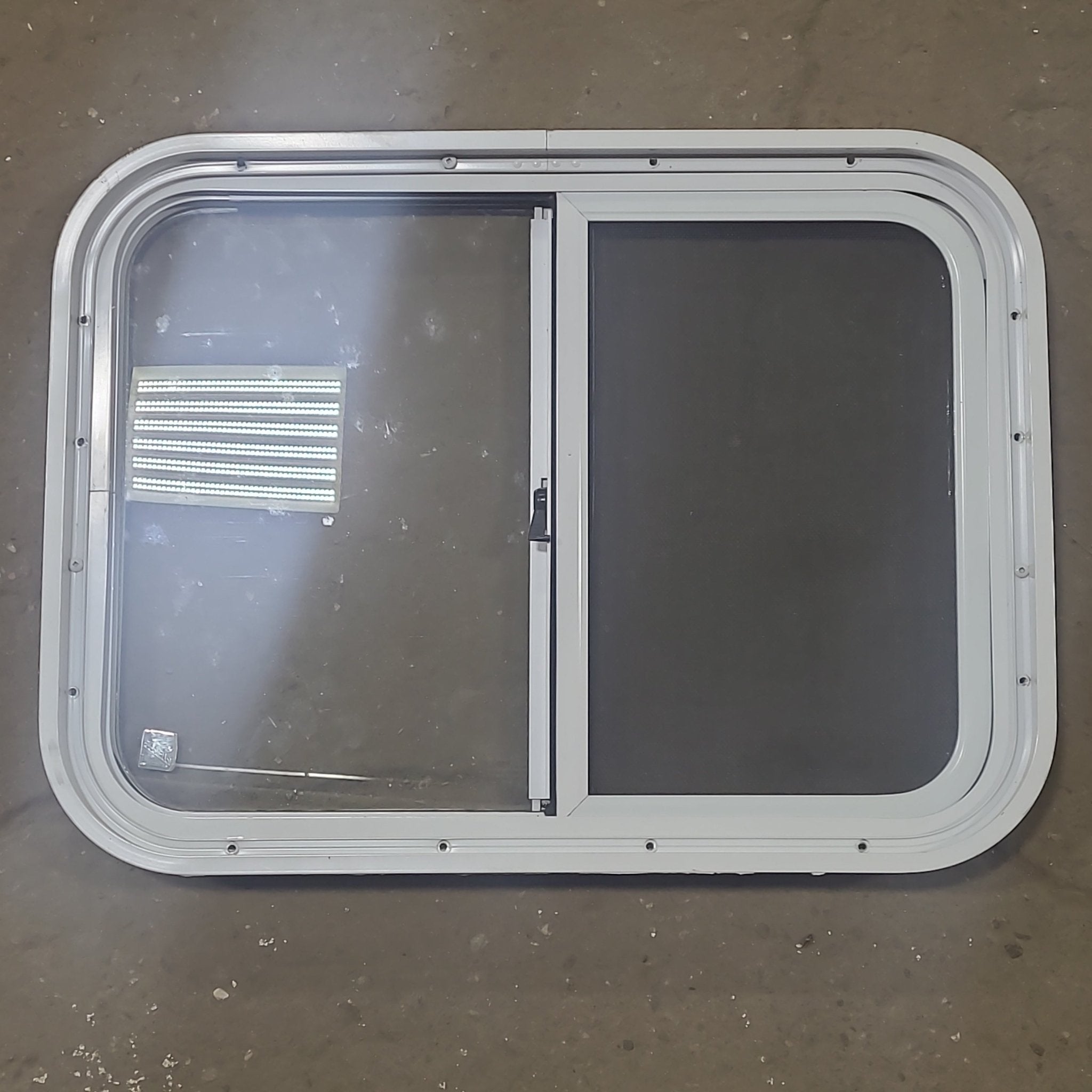 Used White Radius Opening Window : 24 1/4" W x 17 3/4" H x 1 7/8" D - Young Farts RV Parts