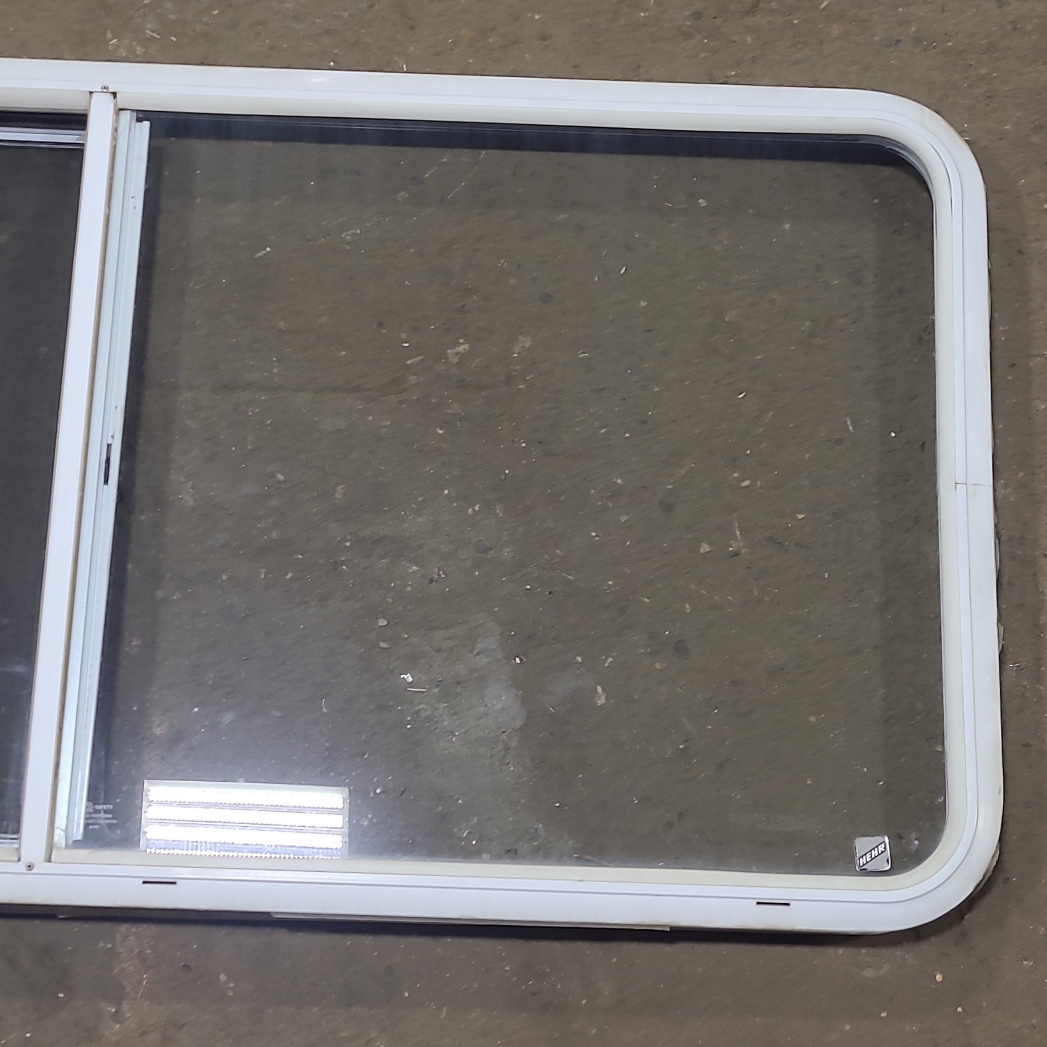 Used White Radius Opening Window : 54 1/4" W x 25 3/4" H x 1 3/4" D - Young Farts RV Parts