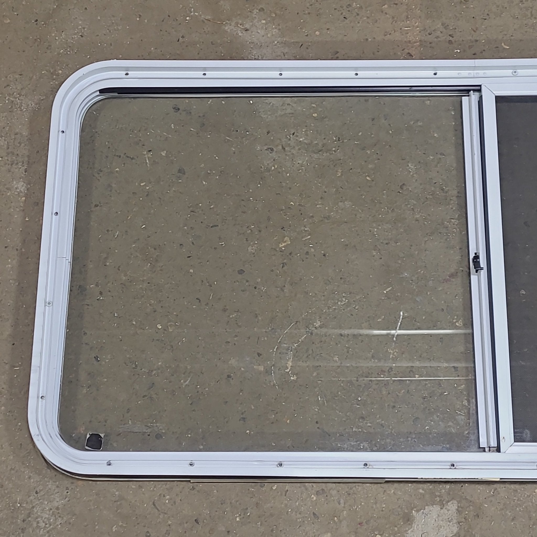 Used White Radius Opening Window : 54 1/4" W x 25 3/4" H x 1 3/4" D - Young Farts RV Parts
