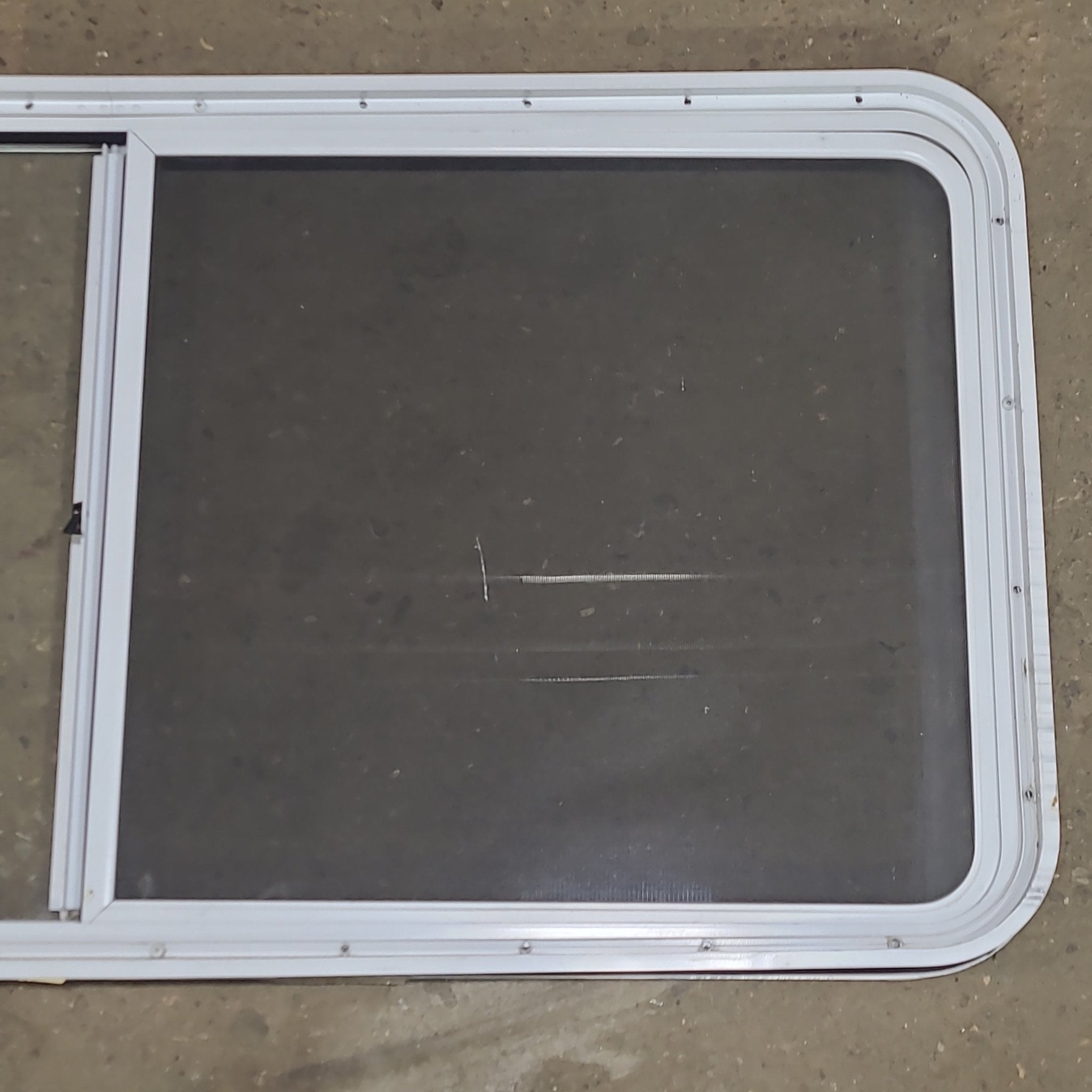 Used White Radius Opening Window : 54 1/4" W x 25 3/4" H x 1 3/4" D - Young Farts RV Parts