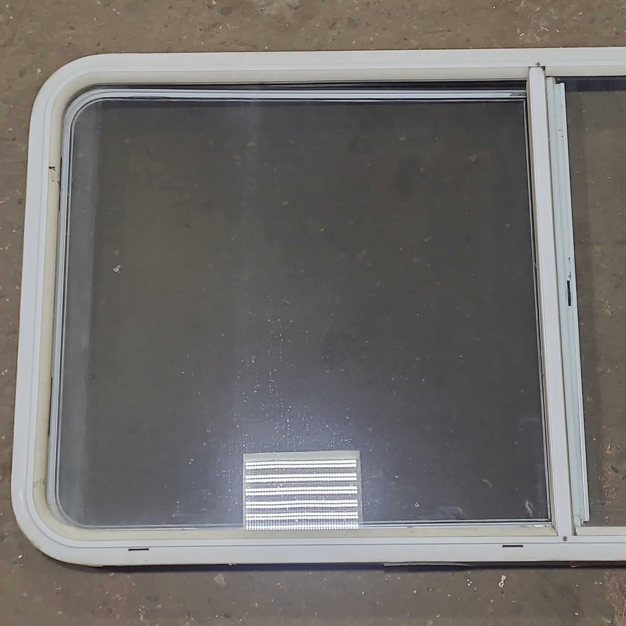 Used White Radius Opening Window : 54 1/4" W x 25 3/4" H x 1 3/4" D - Young Farts RV Parts